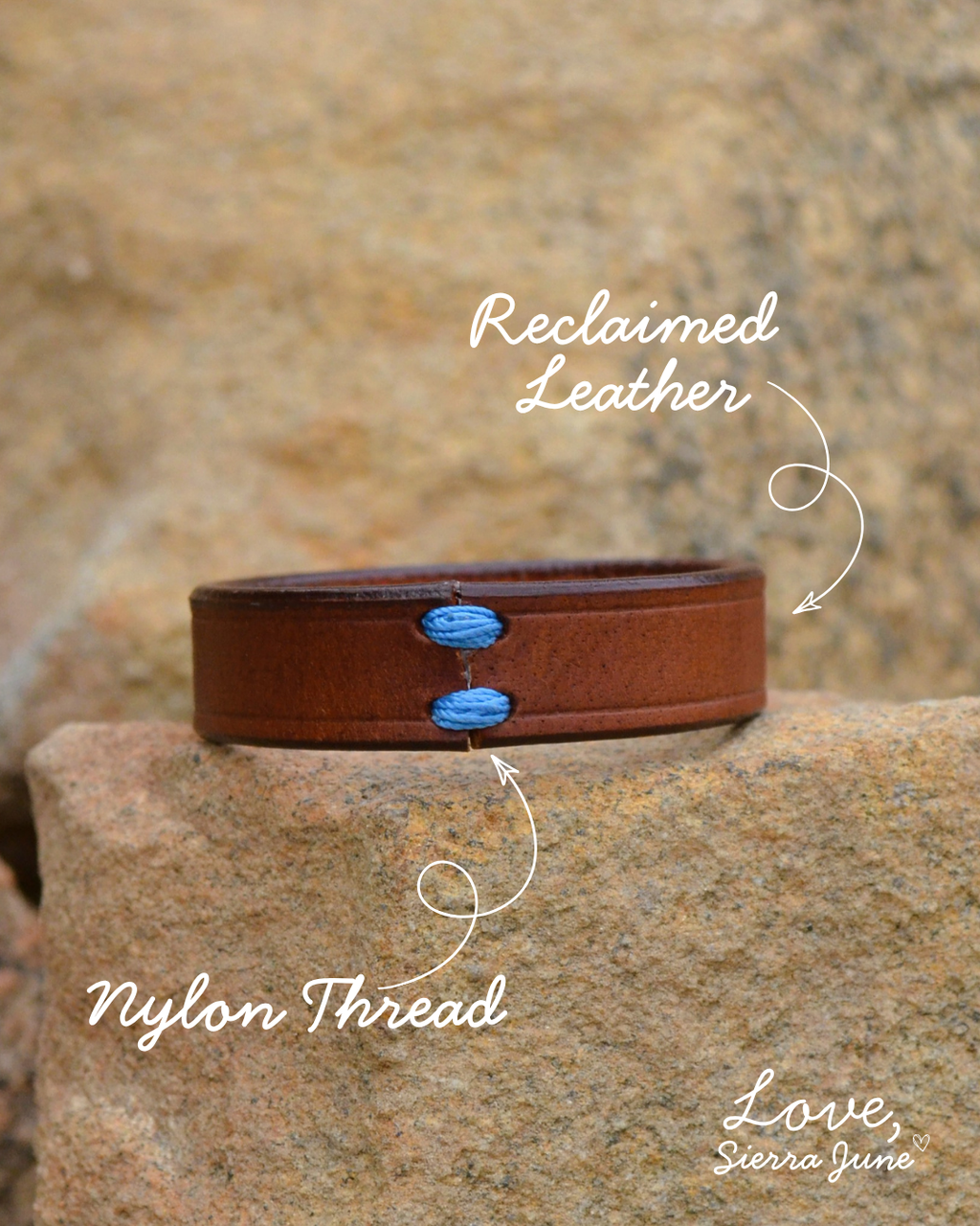 A brown leather cuff bracelet with blue nylon stitching and white text overlays pointing to 'Reclaimed Leather' and 'Nylon Thread', set against a natural rock background.